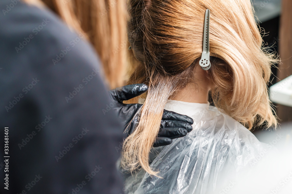 Fototapeta premium Hair dyeing of woman.