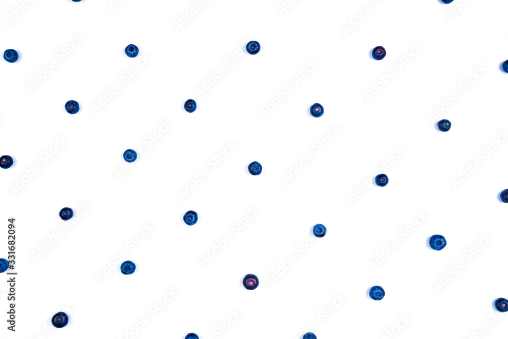 White background with blueberries laid out in a pattern. White background with blueberries laid out in a pattern.