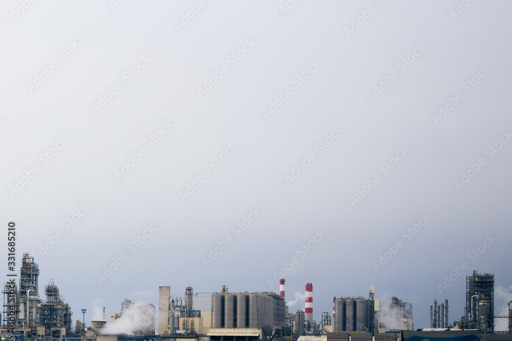 Large modern factory outside in the afternoon Large modern factory outside in the afternoon
