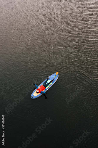 small boat on the water © Александр Лисицин