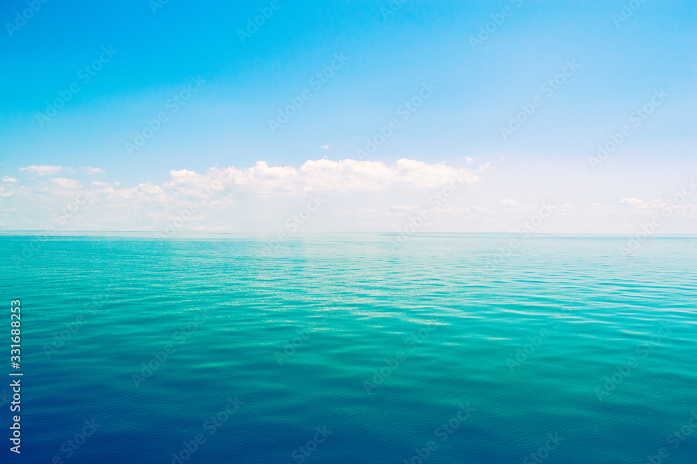 Beautiful sea horizon on a background of blue sky.
