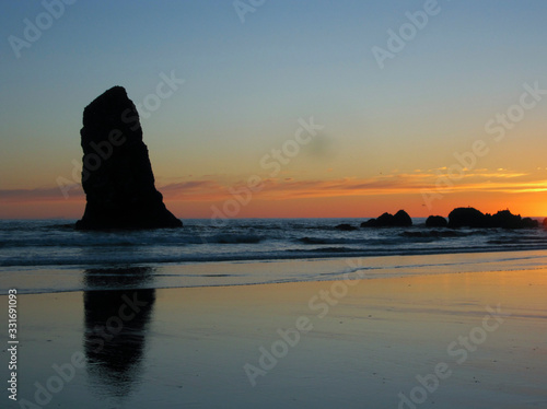 Cannon Beach rocks silhouette at sunset