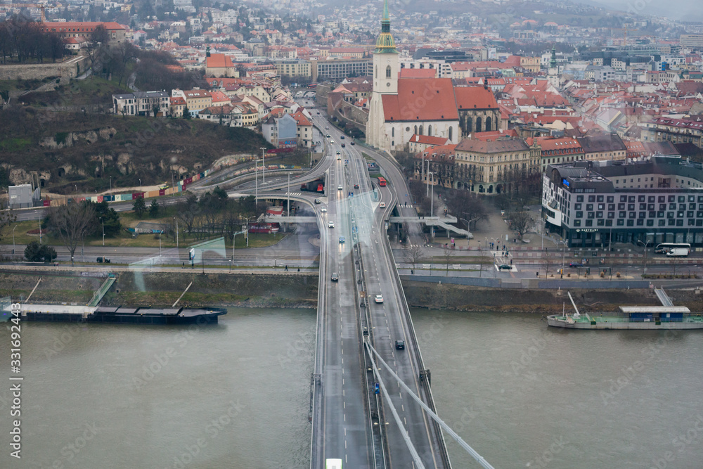 Naklejka premium View of the Danube River and Bratislava from the panoramic cafe in Bridge of the Slovak National Uprising