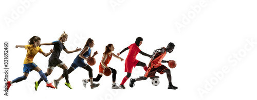 High. Young sportsmen running and jumping on white studio background. Concept of sport, movement, energy and dynamic, healthy lifestyle. Training, practicing in motion. Flyer. Football, basketball.