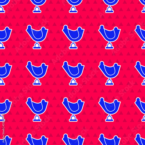 Blue Wild west saddle icon isolated seamless pattern on red background. Vector Illustration