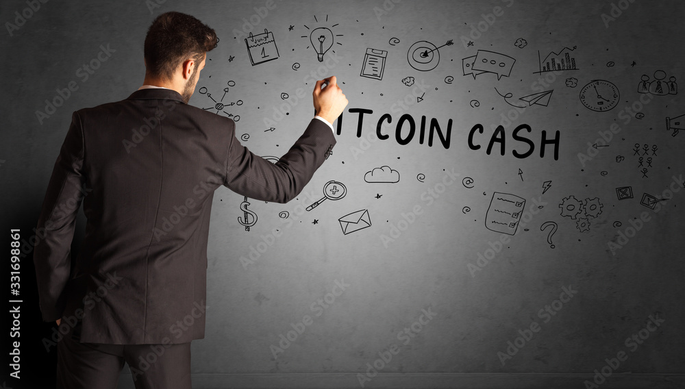 businessman drawing a creative idea sketch with BITCOIN CASH inscription, business strategy concept businessman drawing a creative idea sketch with BITCOIN CASH inscription, business strategy concept