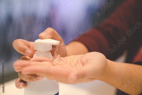 washing hands with alcohol gel concept. prevent the spread of germs and bacteria and avoid infections corona virus, Covid19 , High Res