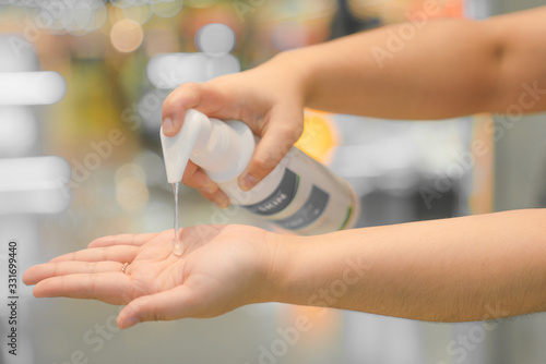 washing hands with alcohol gel concept. prevent the spread of germs and bacteria and avoid infections corona virus, Covid19 , High Res