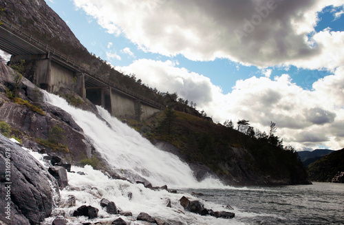 Waterfall Langfossand power station. National tourist route. Famous landmark in Norway at summer time.Beautiful 612m high Langfoss waterfall in Southern Norway.
