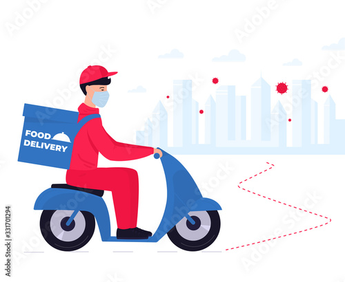 COVID-19. Quarantine in the city. Coronavirus epidemic. Delivery man in a protective mask carries food on a bike