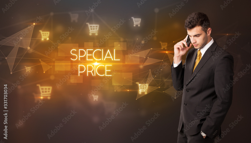 Businessman with shopping cart icons and SPECIAL PRICE inscription, online shopping concept Businessman with shopping cart icons and SPECIAL PRICE inscription, online shopping concept