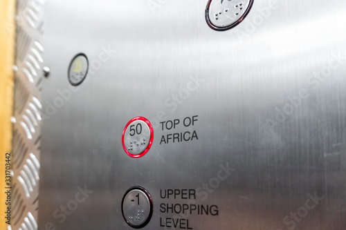 Button in the elevator indicating 50th floor named Top of Africa, Johannesburg