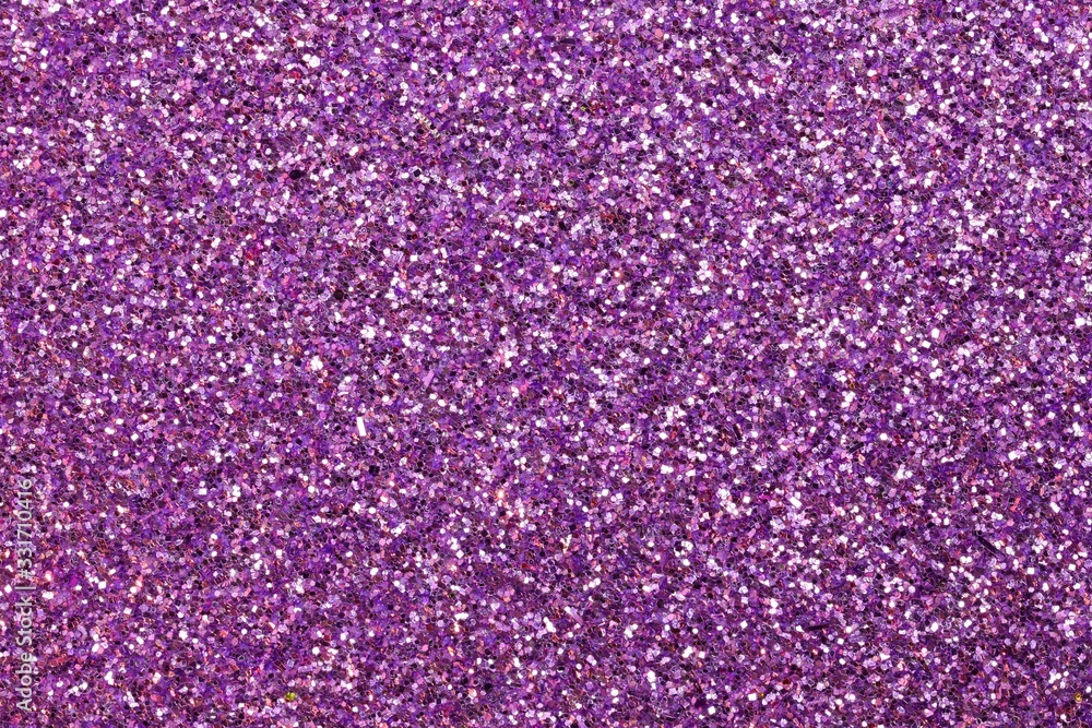 glitter on the glittery purple background ideal as a backdrop