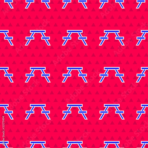 Blue Picnic table with benches on either side of the table icon isolated seamless pattern on red background. Vector Illustration