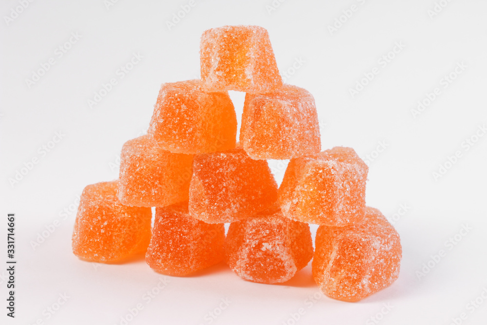 bright orange marmalade on a white background bright orange marmalade on a white background