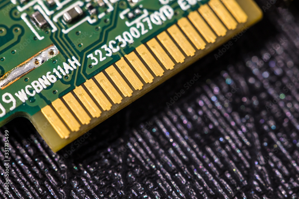 Macro close up view of computer electronic board, part and connector Macro close up view of computer electronic board, part and connector