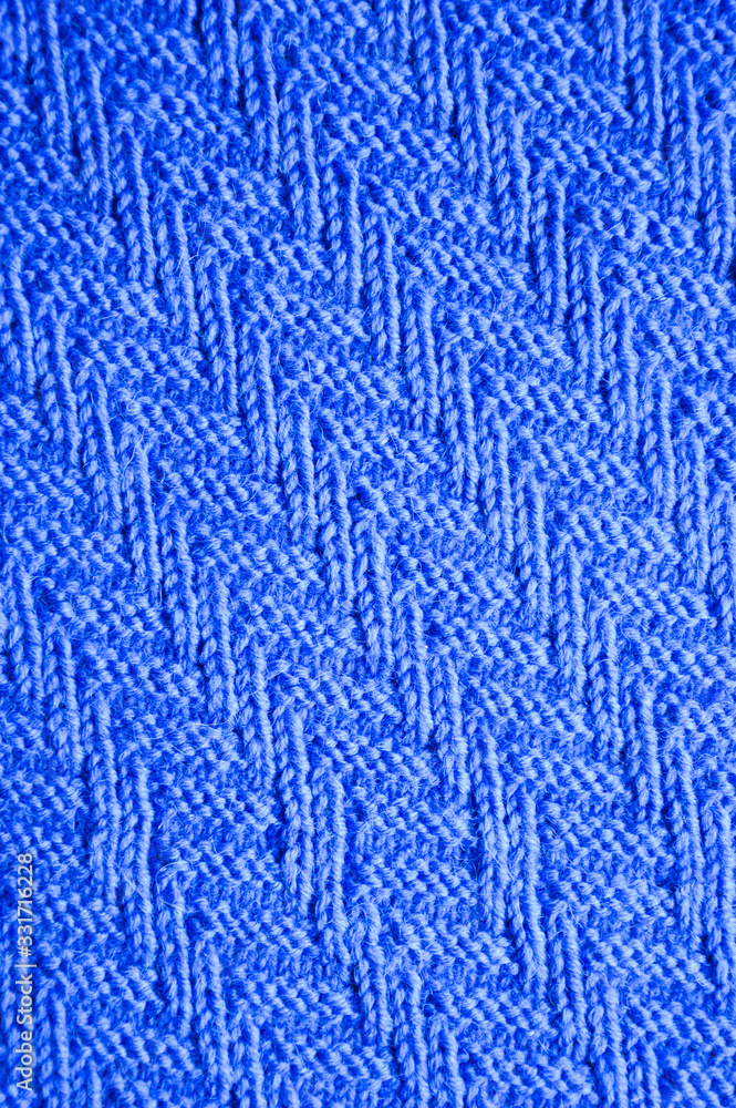 texture of the knitted fabric. background for the design. texture of the knitted fabric. background for the design.