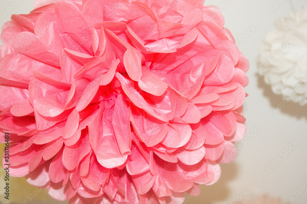 paper flower. beautiful, delicate pompom. decoration for the interior.