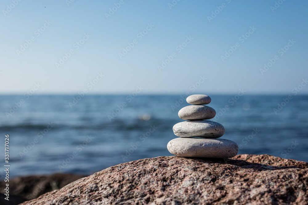 Fototapeta premium Pile of rocks by the sea