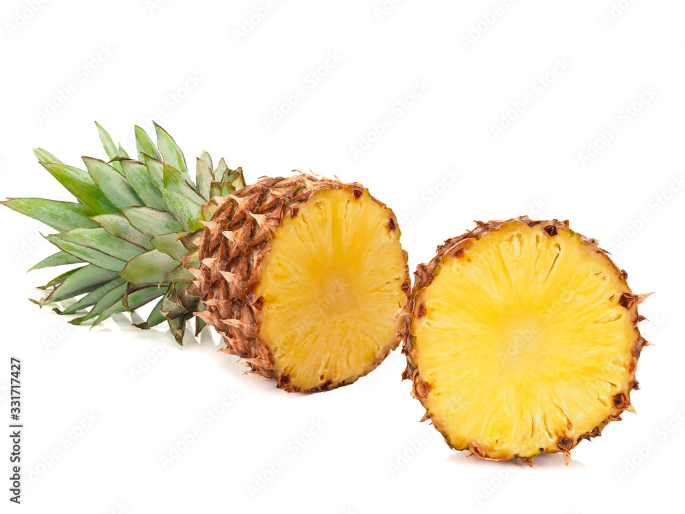 Two halves of pineapple isolated on a white background Two halves of pineapple isolated on a white background
