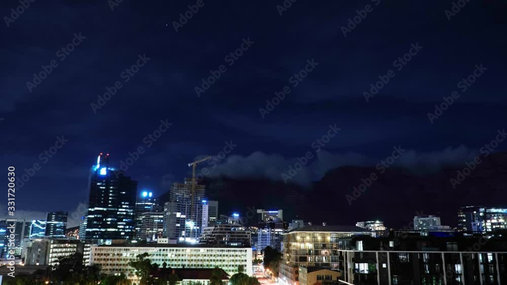 Timelapse: Cape Town City Bowl at Night with Cloudy Table Mountain in Background Timelapse: Cape Town City Bowl at Night with Cloudy Table Mountain in Background
