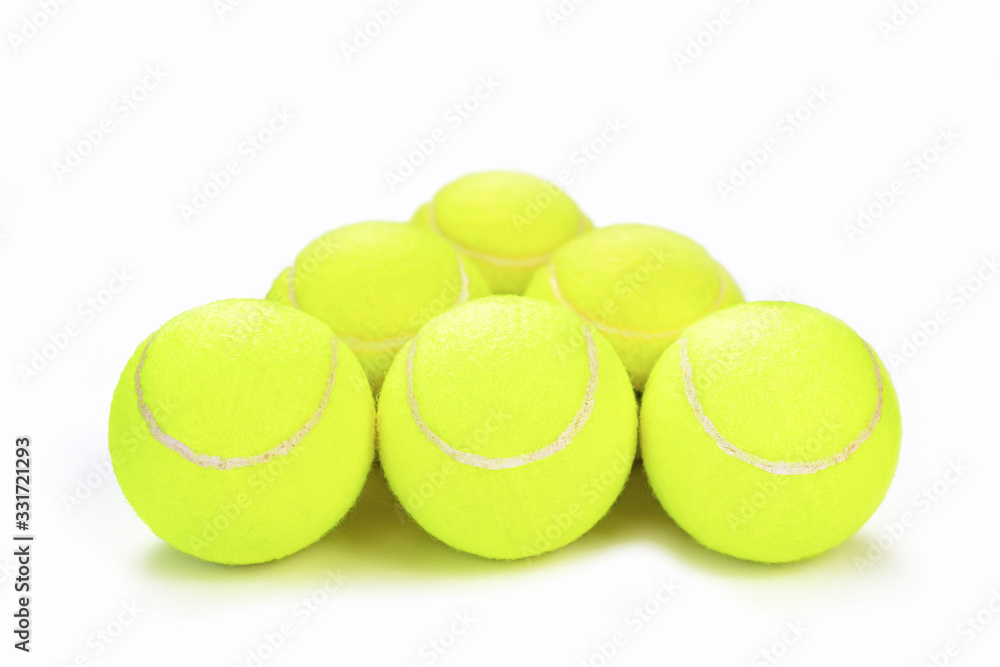 Isolated tennis balls pyramid