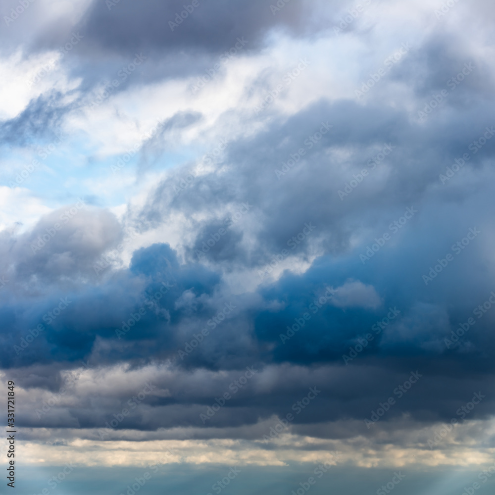 Fantastic clouds against blue sky