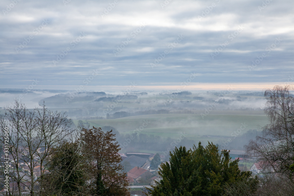 Foggy morning landscape in Langres France