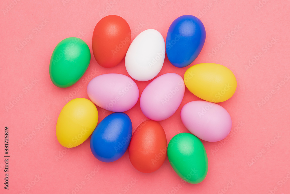 Flat lay colored eggs on table Flat lay colored eggs on table