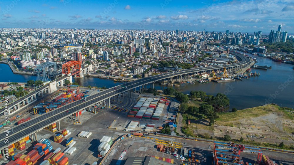 Aerial view with drone port of containers. City background.