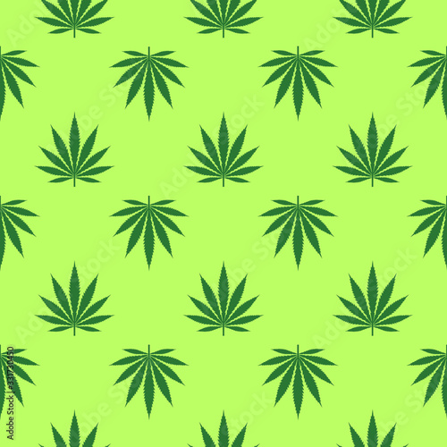 Seamless pattern of Cannabis leaves staggered on green background.