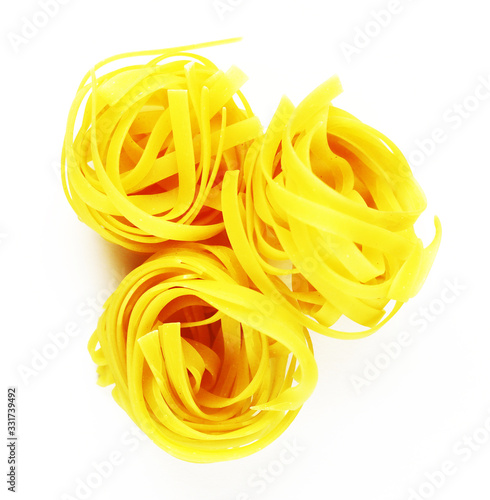 Golden round macaroni on a white background
