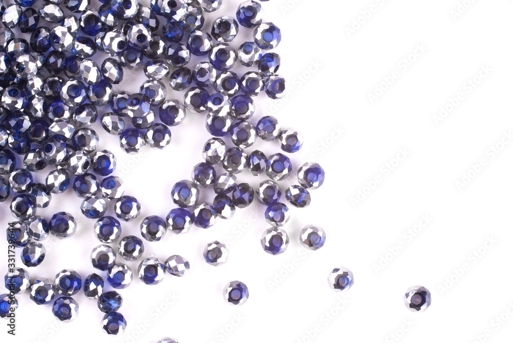 close up multi colored beads heap isolated on white close up multi colored beads heap isolated on white