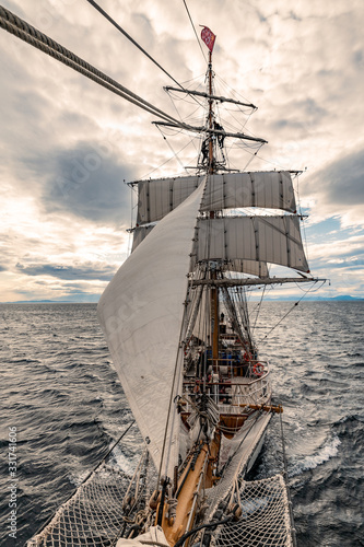 sailing ship in the sea during sunset crossing drake passage 