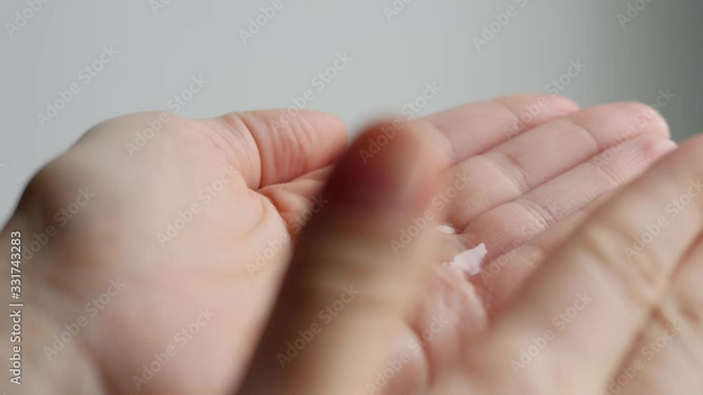 Coronavirus hand sanitizer sanitiser gel for clean hands hygiene corona virus spread prevention. Woman using alcohol rub alternative to washing hands. REAL TIME video. Coronavirus hand sanitizer sanitiser gel for clean hands hygiene corona virus spread prevention. Woman using alcohol rub alternative to washing hands. REAL TIME video.