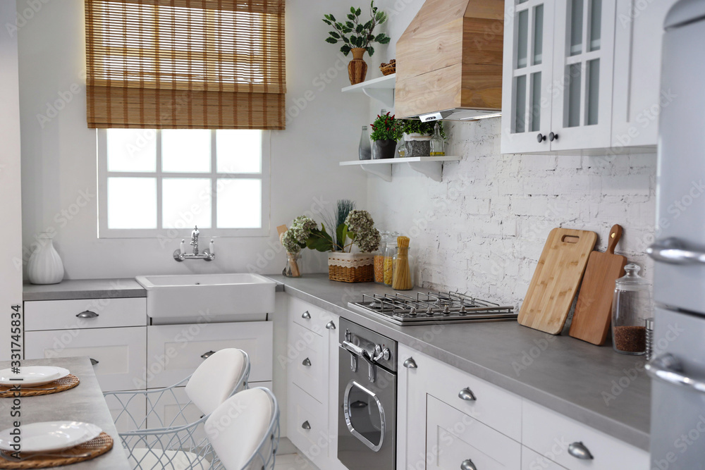 Beautiful kitchen interior with new stylish furniture Beautiful kitchen interior with new stylish furniture