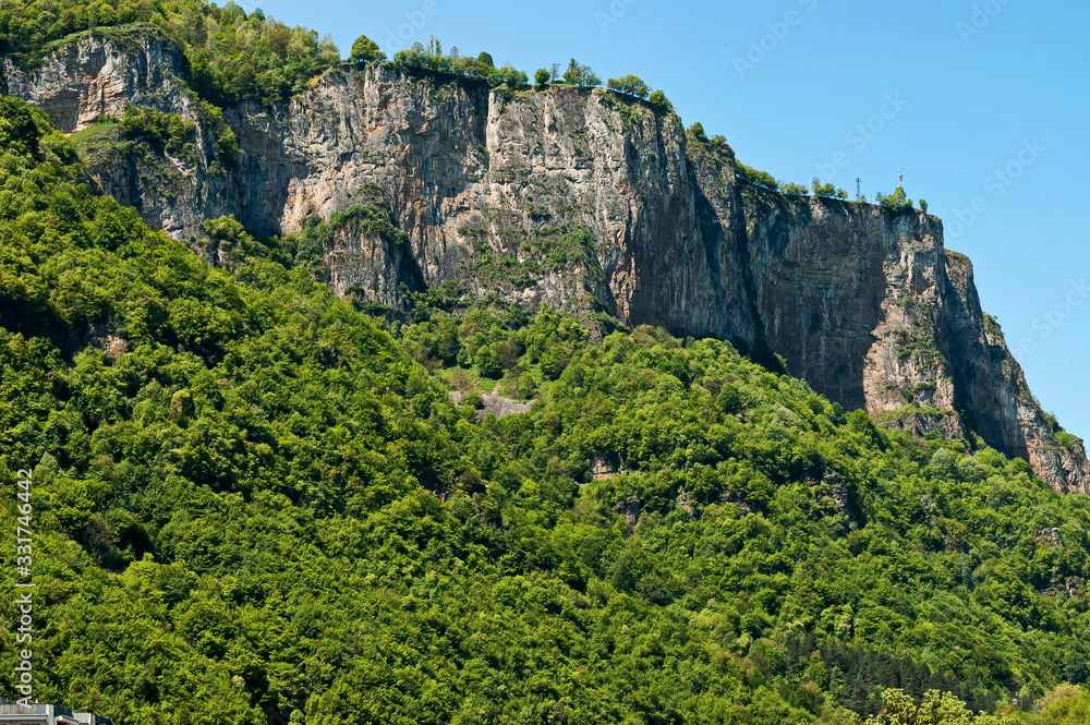 Strange landscape of springtime nature with green mix forest and  rock hill  in  the  Teteven balkan, Bulgaria 