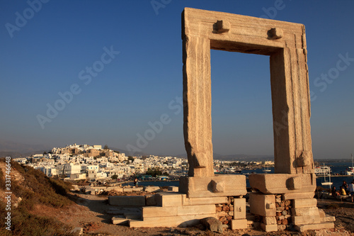 Naxos Town, Naxos / Greece - August 25, 2014: Gate of the temple of Apollo, Portara, Naxos Town, Naxos, Cyclades Islands, Greece