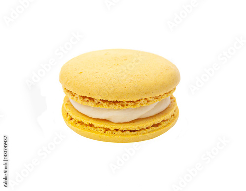 one yellow macaroon on a white isolated background