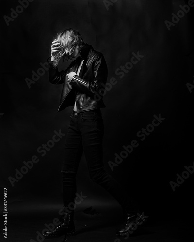  Rock and roll girl on a black background