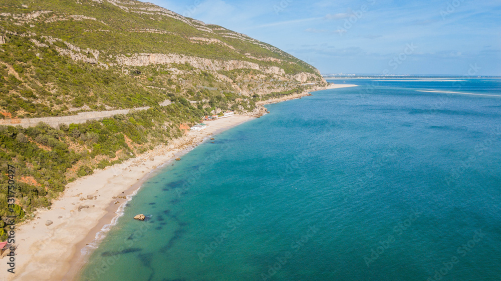 Aerial view of Galapinhos and Galápos beaches. Beautiful beaches with transparent waters in Arrábida, in Setúbal, Portugal