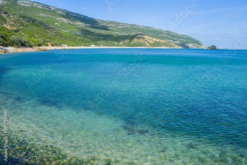 Portinho da Arrábida beach, in Setúbal, Portugal. Transparent water beach