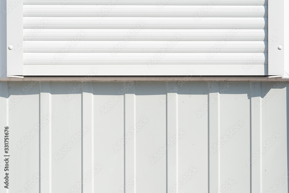 Abstract view of white anti-theft shutters Abstract view of white anti-theft shutters