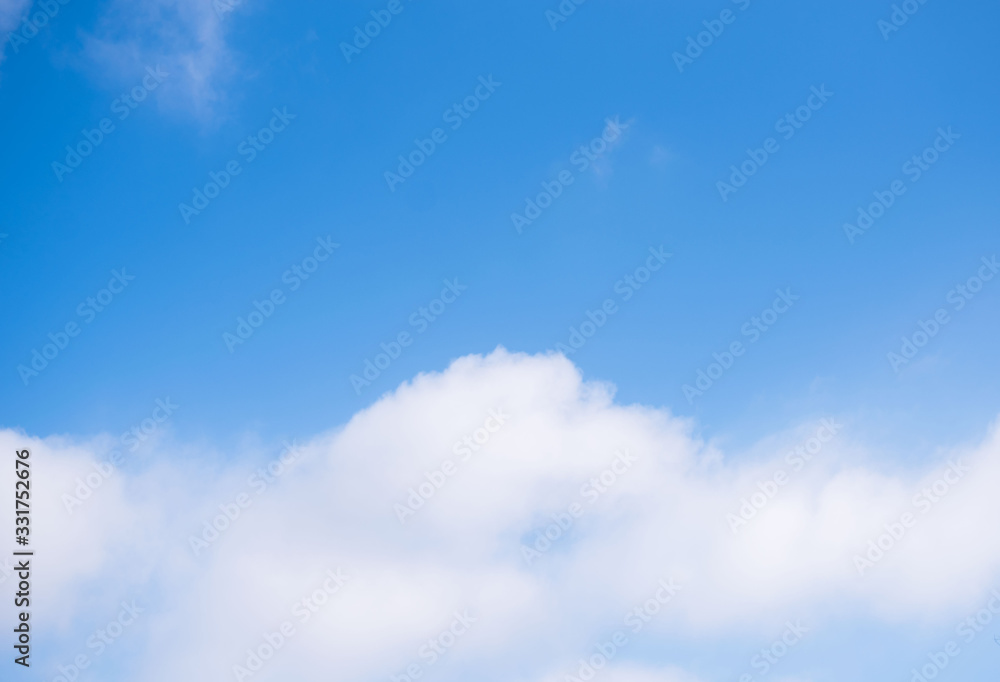 Beautiful white clouds in the blue sky on a sunny day. Beautiful white clouds in the blue sky on a sunny day.