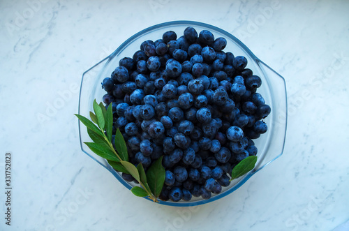 Fresh organic blueberry background. Texture blueberry berries close up. Concept of healthy and dieting eating