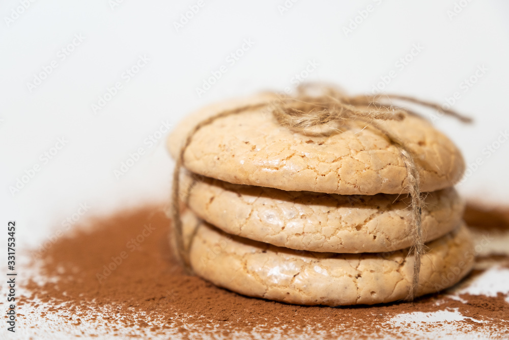 oatmeal cookies tied with a plait and sprinkled with chocolate, close-up. oatmeal cookies tied with a plait and sprinkled with chocolate, close-up.