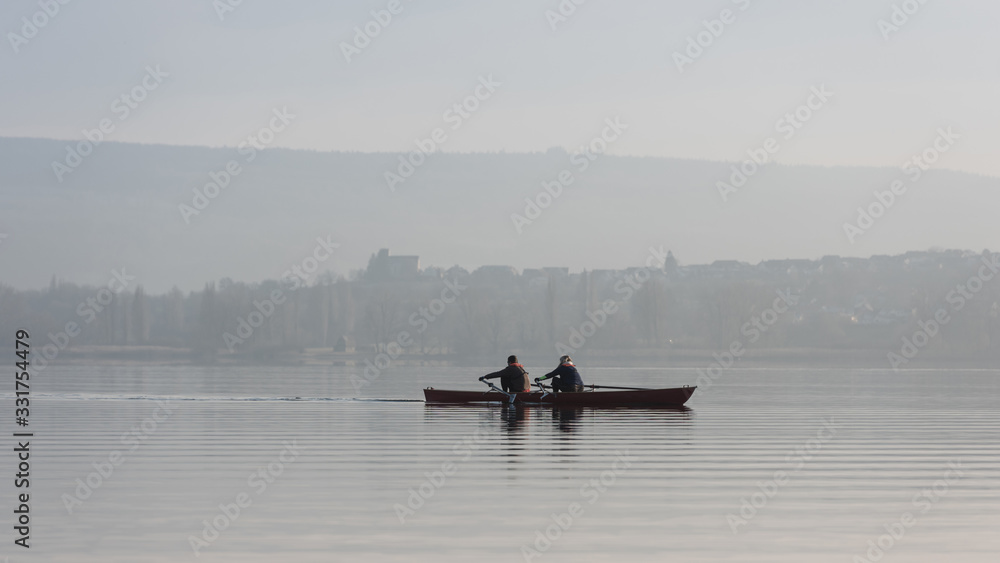 Boating in the dawn on Lake Constance (Bodensee); Germany