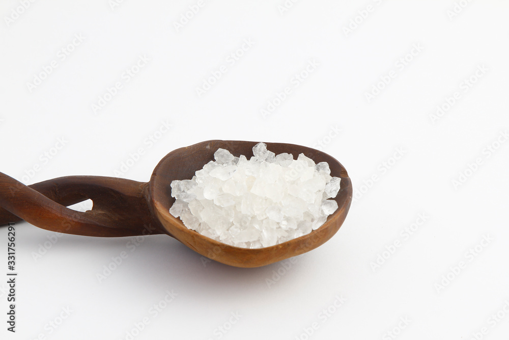sea salt in a bowl isolated on white background sea salt in a bowl isolated on white background