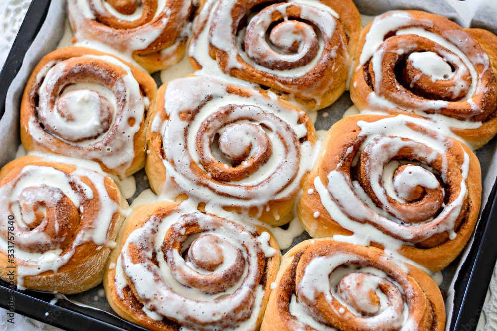 Fototapeta premium Fresh homemade Cinnamon rolls or Cinnamon buns