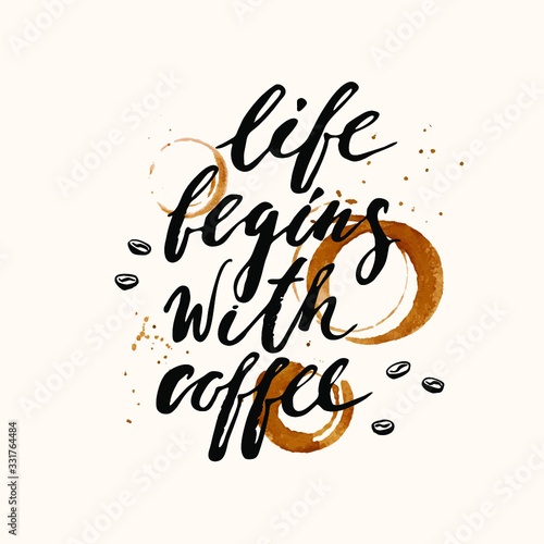 Hand drawn ink lettering with coffee cup prints and stains. Life begins with coffee.